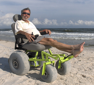 accessible relaxation at the beach in a wonderful powered beach wheelchair